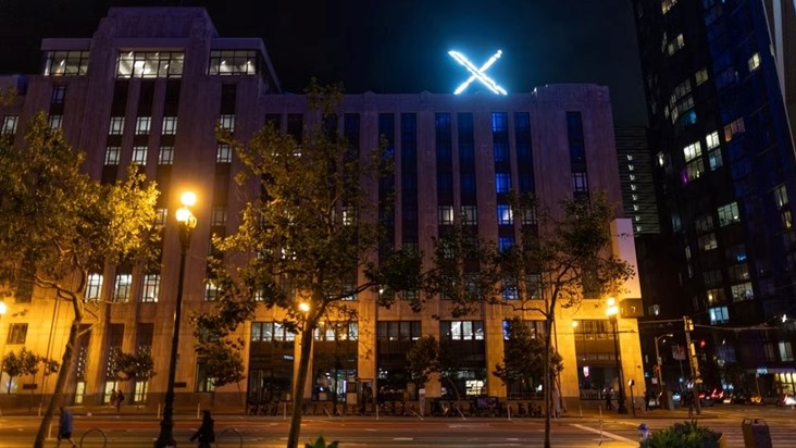 elon musk logo x at night