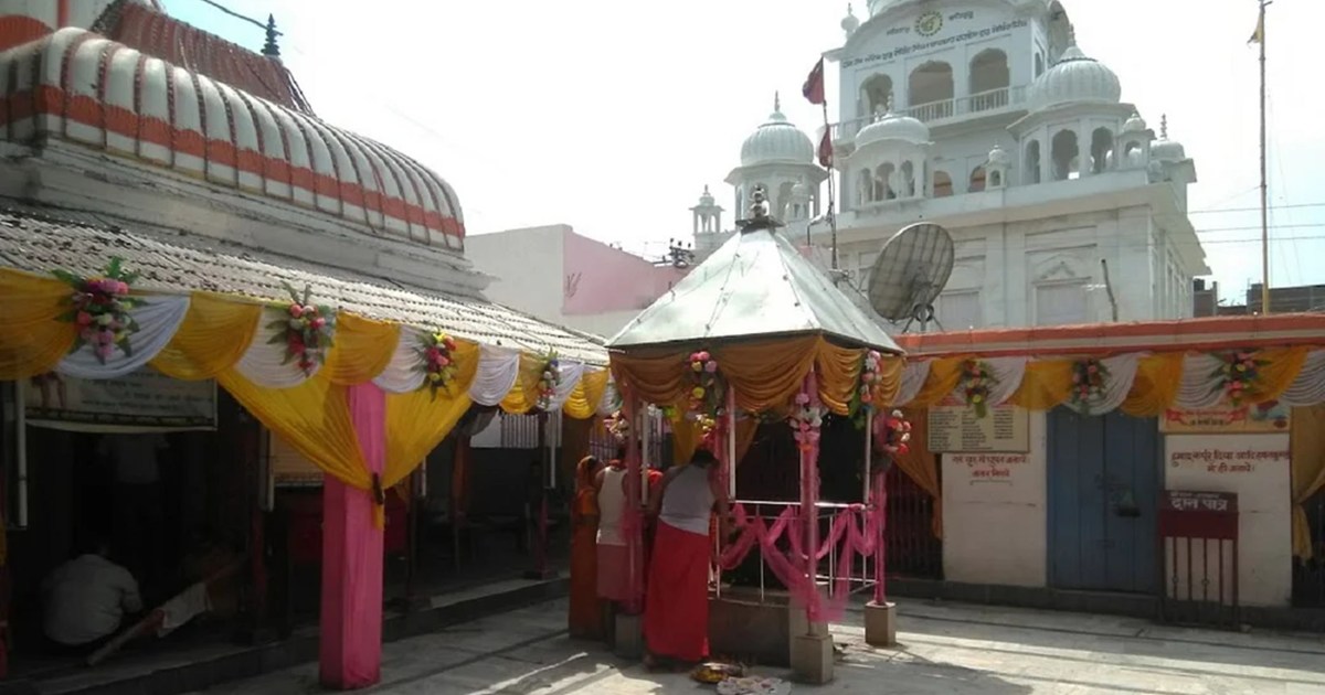 In Sawan, a long queue of devotees forms to offer prayers in