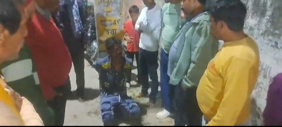 A youth was caught red handed stealing a mobile phone at a w