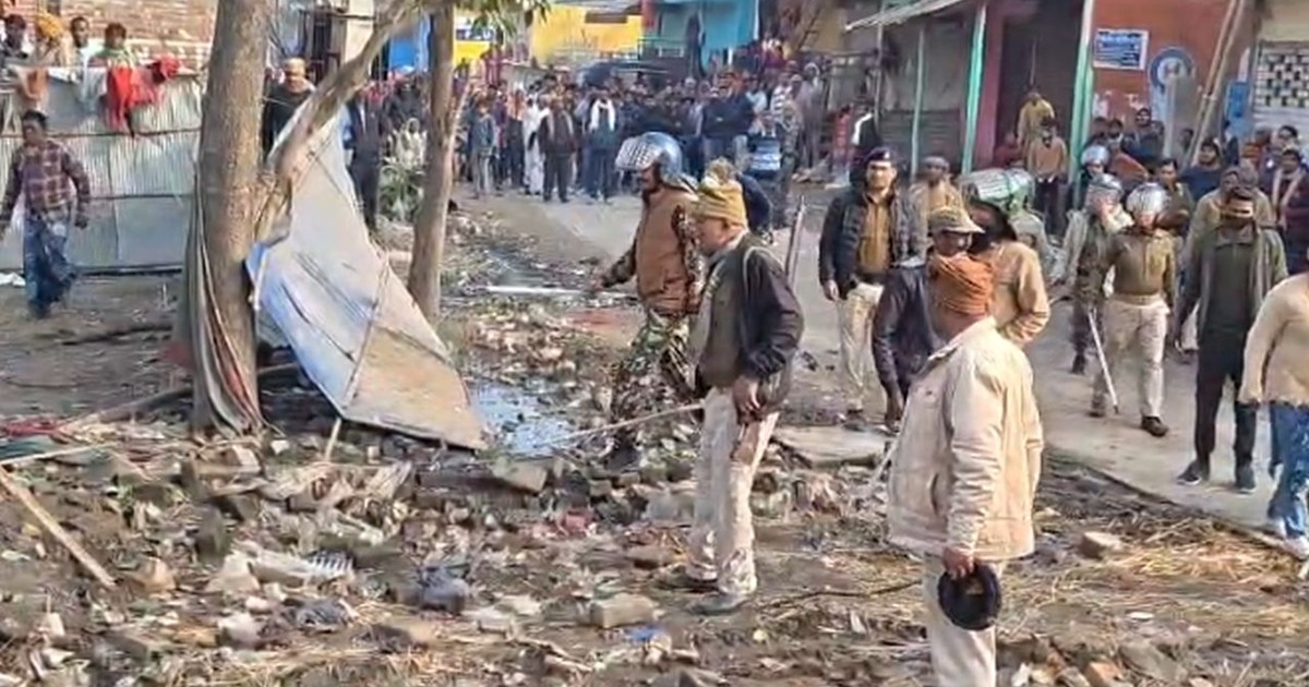 A team of administrative officials who went to remove encroa