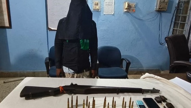 The criminal was caught by the police before he could carry 