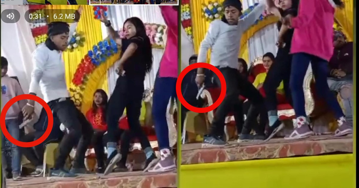 Video of young man waving arms at orchestra during wedding c