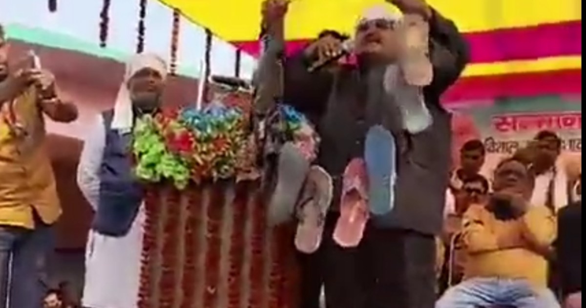 Former Bihar government minister arrives with a garland of s