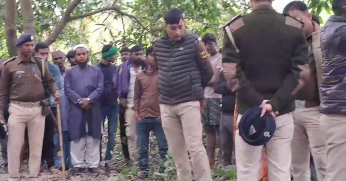 The body of a young man was found hanging from a tree in the