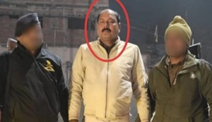 right at the police station gate...