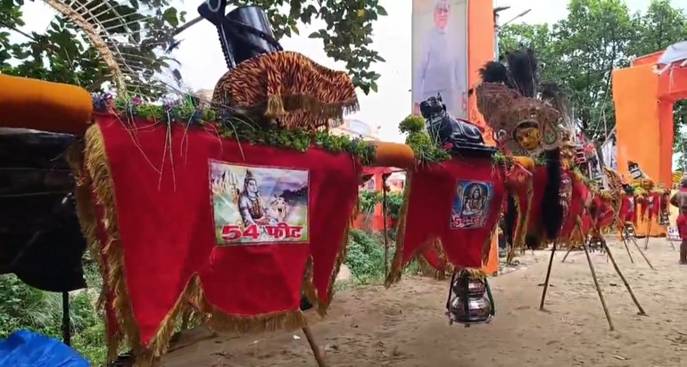Kanwariyas set out with the slogan of Bol Bam carrying a 54 Kanwariyas set out with the slogan of Bol Bam carrying a 54