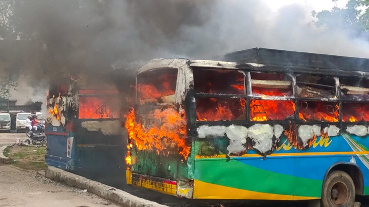 4 buses burnt together, fire engine arrived in a hurry