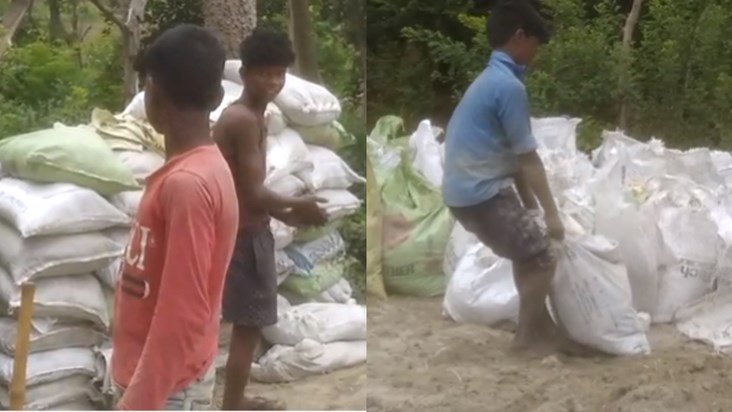 Child laborers busy preparing for flood control, district ad Child laborers busy preparing for flood control, district ad