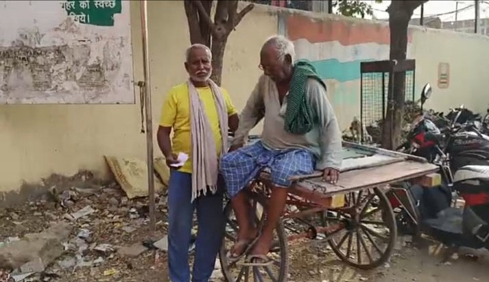 Elderly voters arrived to vote on a cart Elderly voters arrived to vote on a cart
