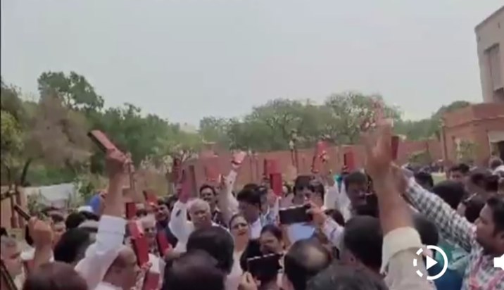 Opposition parties demonstrated with a copy of the Constitut Opposition parties demonstrated with a copy of the Constitut