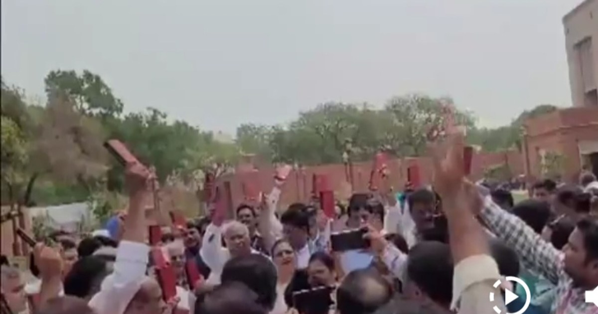 Opposition parties demonstrated with a copy of the Constitut