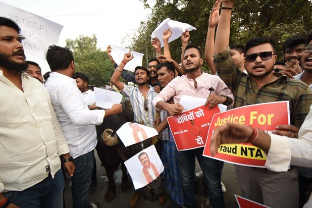 Students protest with buffalo and donkey regarding NEET exam Students protest with buffalo and donkey regarding NEET exam