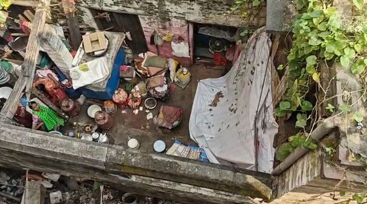 Six people trapped after nearly 100-year-old house collapses