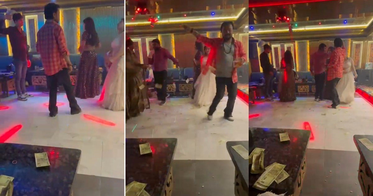 Panchayat secretary was dancing with a bar girl with a glass