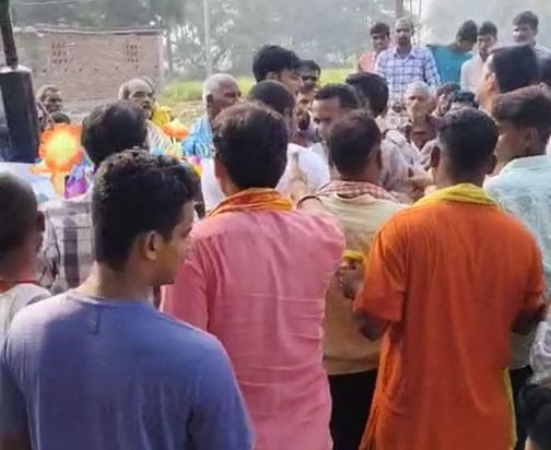 Protest against the song being played in support of a candid Protest against the song being played in support of a candid