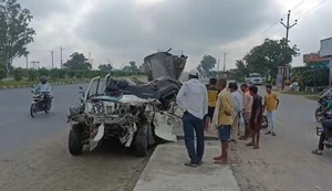 Scorpio collided heavily with a stationary container truck.