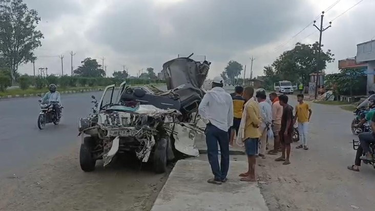 Scorpio collided heavily with a stationary container truck.