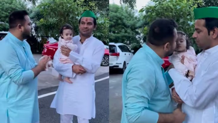 Katyayani playing in the lap of elder father Tej Pratap Yada