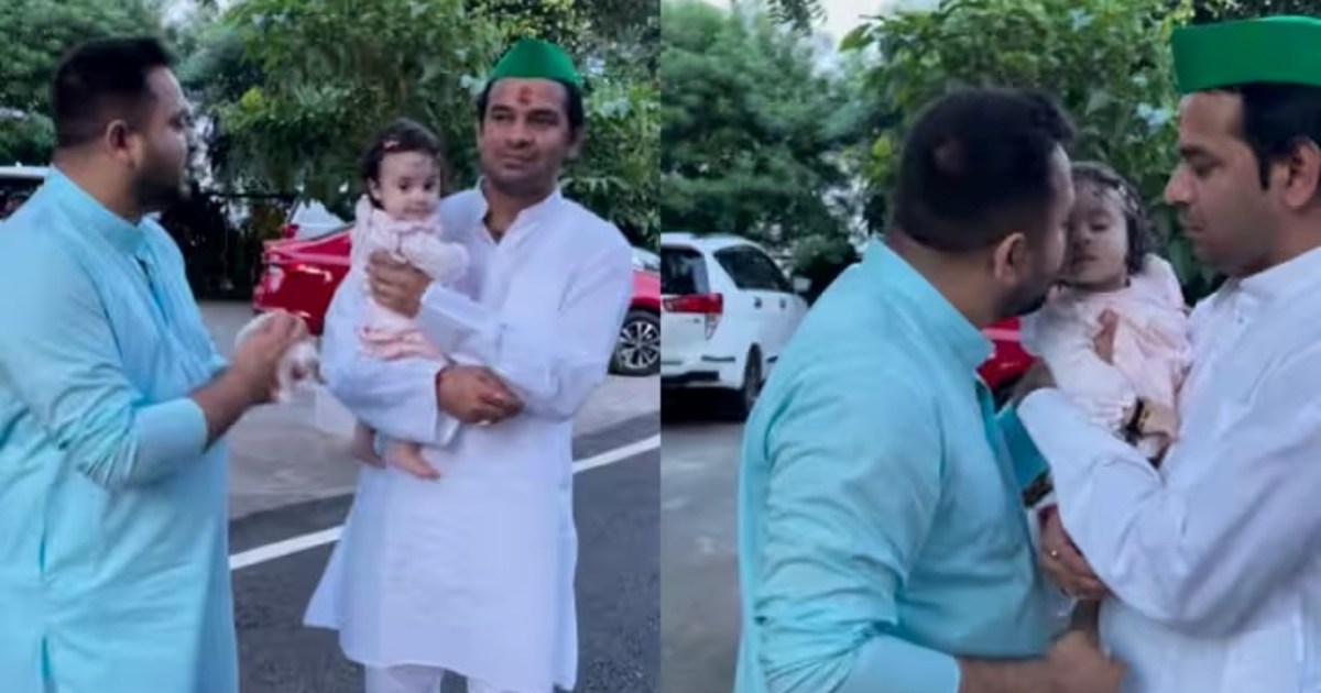 Katyayani playing in the lap of elder father Tej Pratap Yada