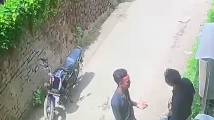 A miscreant shot a young man in front of the police station