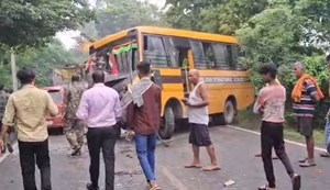 A bus carrying school children collided with a truck.
