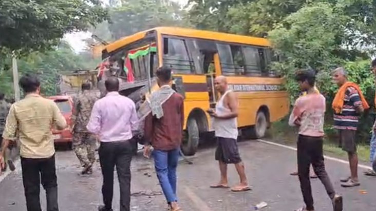 A bus carrying school children collided with a truck.