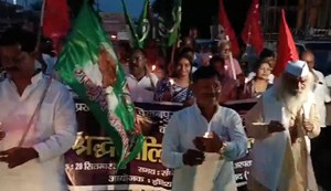 The Grand Alliance held a march demanding the arrest of the accused in the vegetable vendor's murder case.