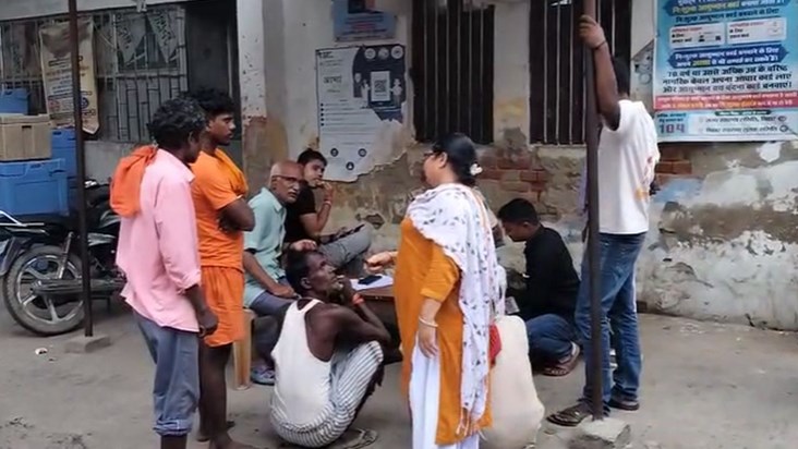Three people carrying their son's gifts to their girl's hous